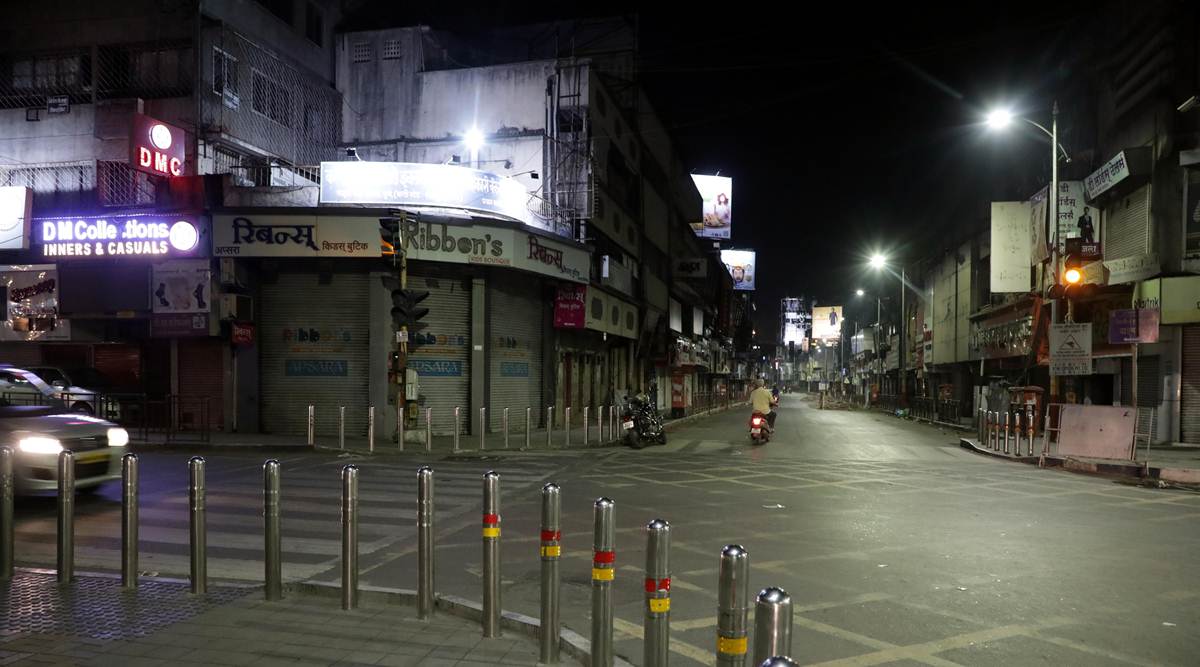 In Pune on Monday night. Night curfew has been imposed in the state to check the spread of Covid-19. (Express photo by Arul Horizon)