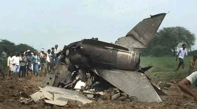 Wreckage of the IAF MiG-21 Bison fighter jet lies in a Gwalior field. (PTI)