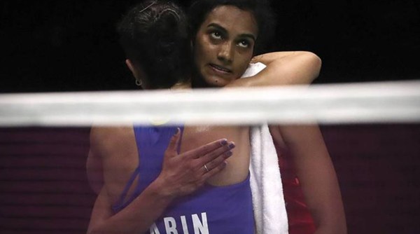 In this file photo, PV Sindhu hugs Carolina Marin after the match.  (Source: Associated Press)