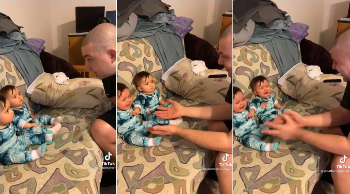Baby tries to protect twin after failing to recognise dad after he shaves, watch viral video