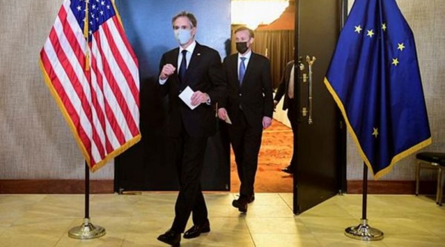 U.S. Secretary of State Antony Blinken and National Security Advisor Jake Sullivan exit the ballroom from the closed-door morning session of talks between the United States and China upon conclusion of their two-day meetings in Anchorage, Alaska, U.S. March 19, 2021. (Frederic J. Brown/Pool via REUTERS)
