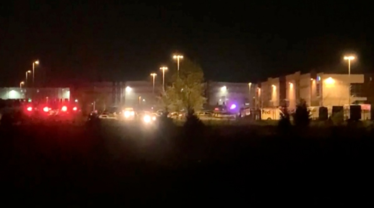 This image made from video shows a wide view of building with flashing lights from emergency vehicles in Indianapolis, IN, Friday, April 16, 2021.  (WRTV via AP)