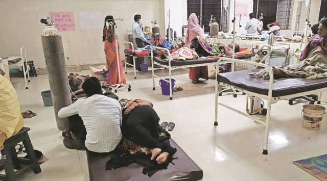 Not enough beds for symptomatic patients waiting for their test results at a Covid hospital in Jagdalpur. (Express photo)