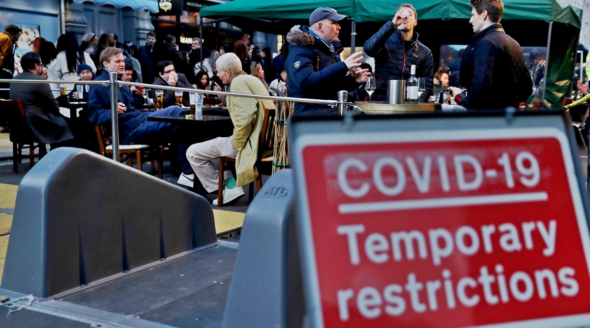 In August 2020 the government offered diners up a 50% discount of up to 10 pounds ($13.82) per head on meals between Mondays and Wednesdays to kick-start the economy and encourage people to spend money again after the pandemic lockdown. (AP)

