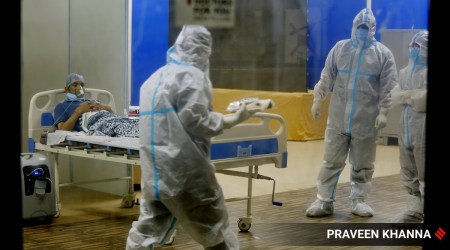Covid-19 Patients and their family members at a Covid-19 Isolation center at CWG in New Delhi on Tuesday. 