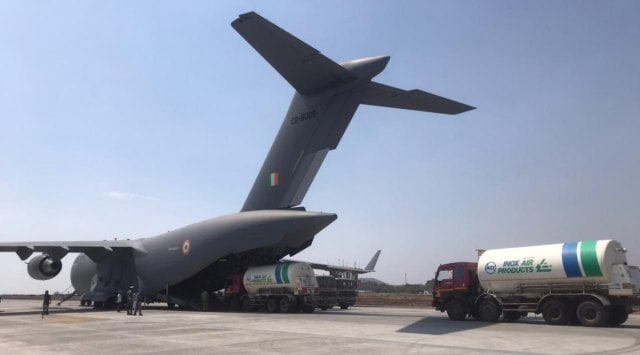 A second C-17 is being loaded with two more empty Oxygen containers at Pune Air Base. (Photo: Twitter @Indian Air Force)