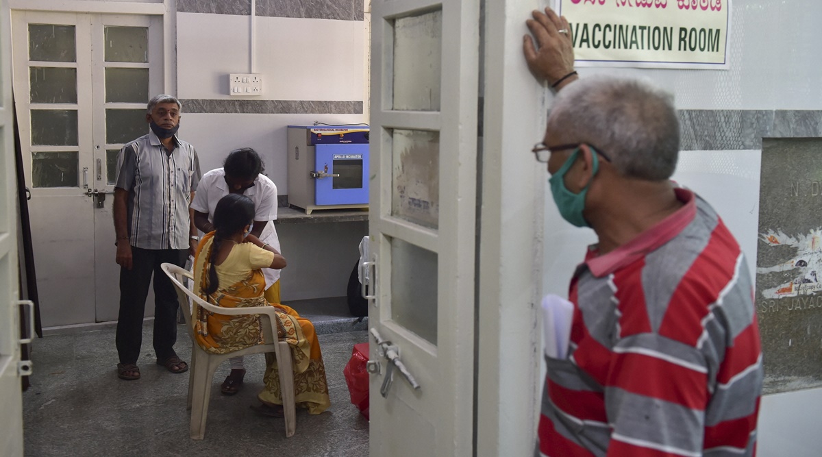 A medic administers the Covid-19 vaccine in Bengaluru on Friday. (PTI)