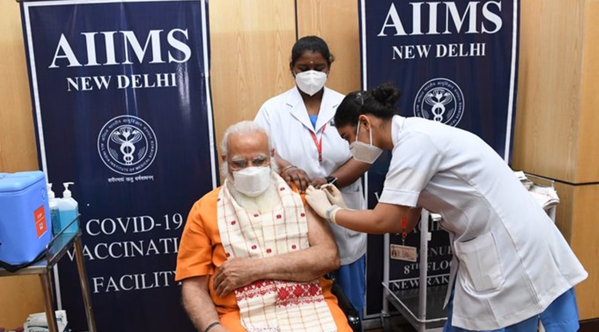 Prime Minister Narendra Modi receiving the vaccine (Twitter/Narendra Modi)