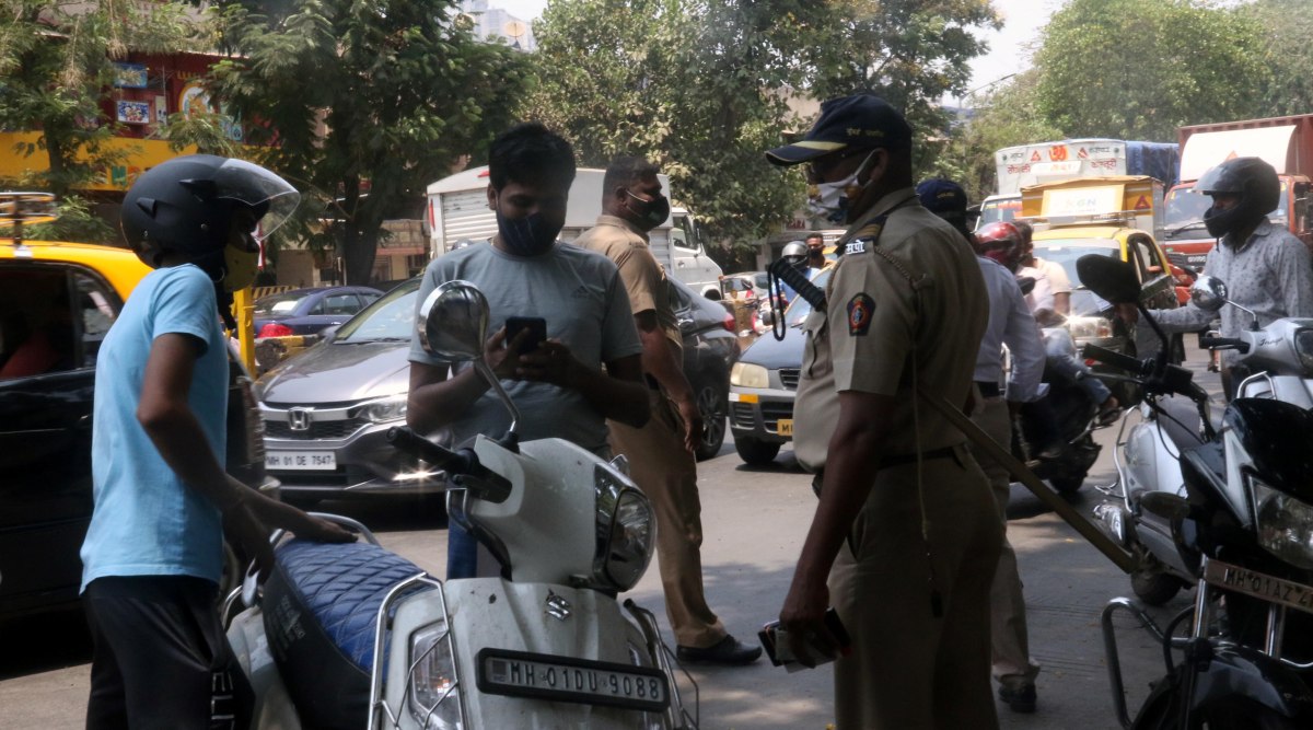 Policemen at a checkpoint in Mumbai. (Express Photo by Ganesh Shirsekar)
