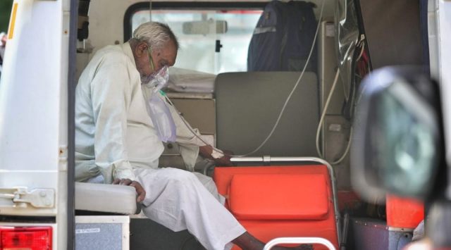 Covid patients with oxygen support waits for more than 12hrs to get admission at 600 bed Covid ward at Civil hospital in Gandhinagar. 
(Express photo by Nirmal Harindran)