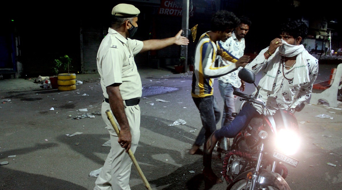 Gurugram: Police stop bikers during night curfew (PTI)