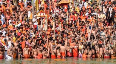Devotees gather to offer prayers during the Kumbh Mela 2021, at Har ki Pauri Ghat in Haridwar. (PTI Photo)