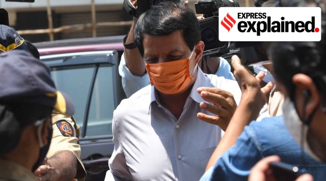 Pradeep Sharma appears before the NIA in connection with the Mukesh Ambani bomb scare case on Wednesday. (Express Photo: Ganesh Shirsekar)