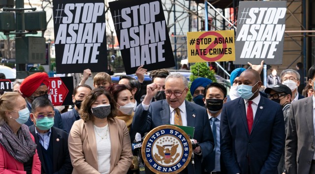 Senate Majority Leader Chuck Schumer (centre) is joined by US Republican Grace Meng (third from left) at a news conference to discuss the Asian-American hate crime Bill. (AP)