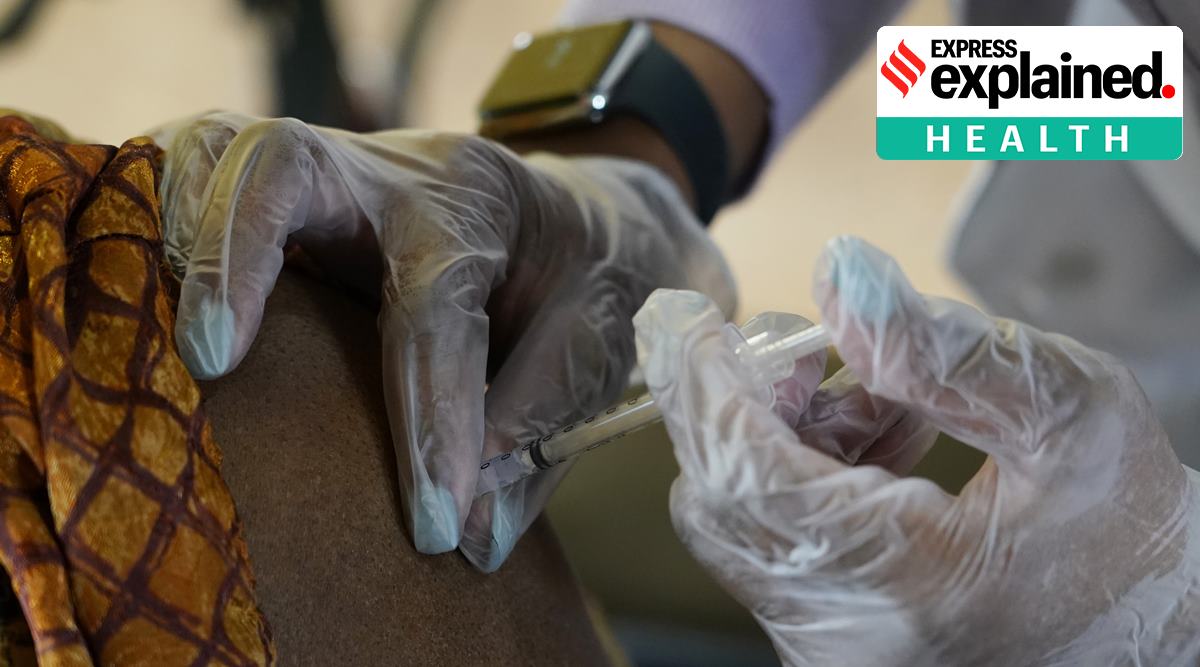 A resident of Harmony Court Assisted Living receives the Pfizer-BioNTech COVID-19 vaccine in Jackson, Miss. (AP Photo/Rogelio V. Solis, File)