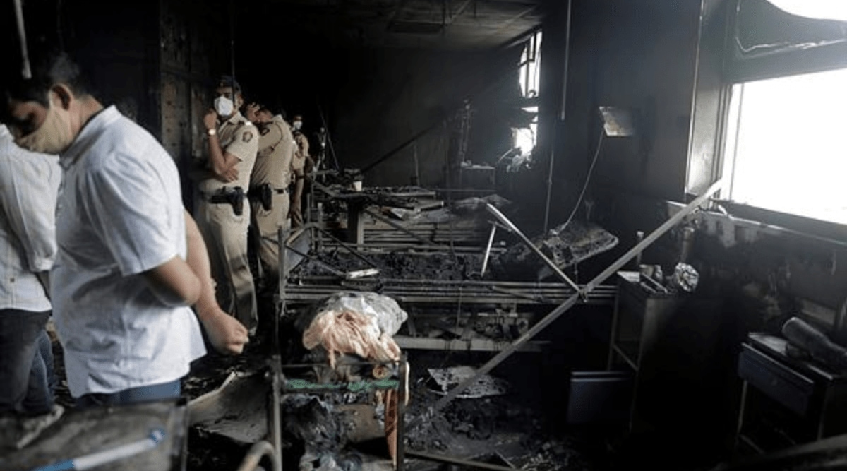 People inspect an ICU ward after a fire broke out in Vijay Vallabh COVID-19 hospital at Virar, near Mumbai, India, Friday, April 23, 2021. (PTI Photo)