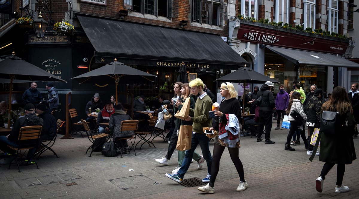 People return to Carnaby Street in London on Monday, April 12, 2021, as retail shops reopen and the country emerges from a COVID-19 lockdown. (Mary Turner/The New York Times)