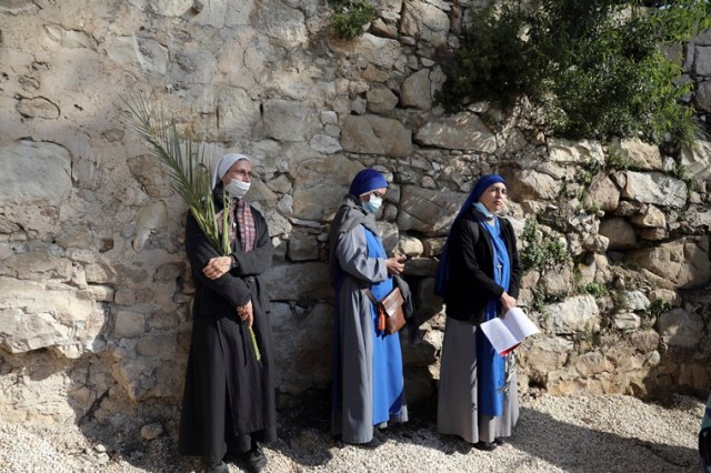 Nuns mark Palm Sunday on the Mount of Olives in Jerusalem. (Photo: AP)