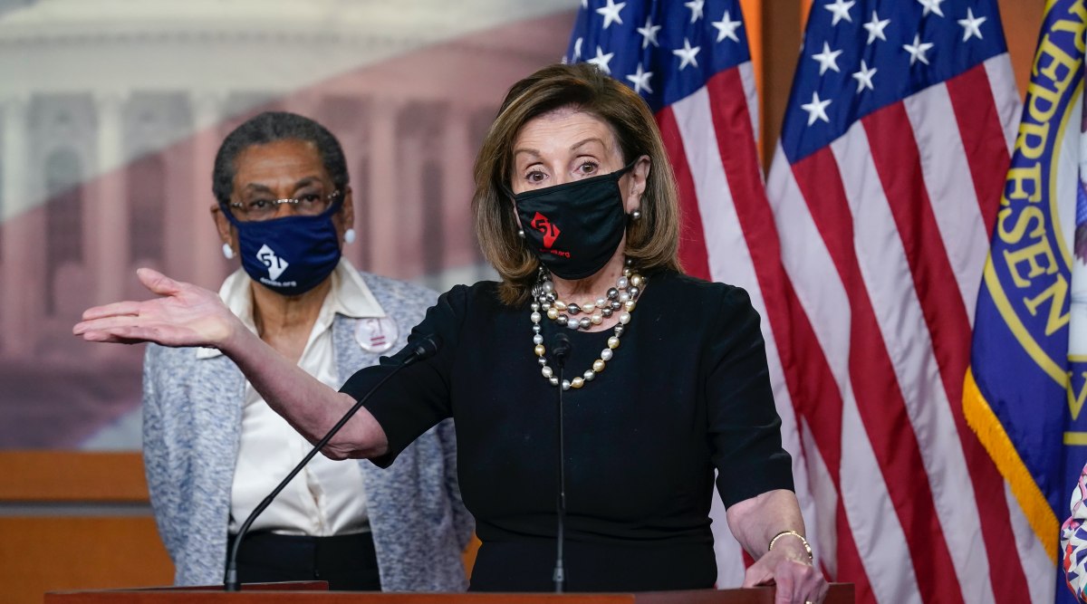 House Speaker Nancy Pelosi, D-Calif., joins Del. Eleanor Holmes-Norton, D-D.C., left, at a news conference ahead of the House vote on H.R. 51- the Washington, DC Admission Act, on Capitol Hill in Washington, Wednesday, April 21, 2021. (AP Photo/J. Scott Applewhite)