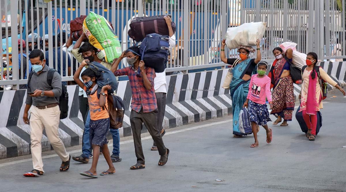 Migrants at Kempegowda bus station, in Bengaluru. (PTI)