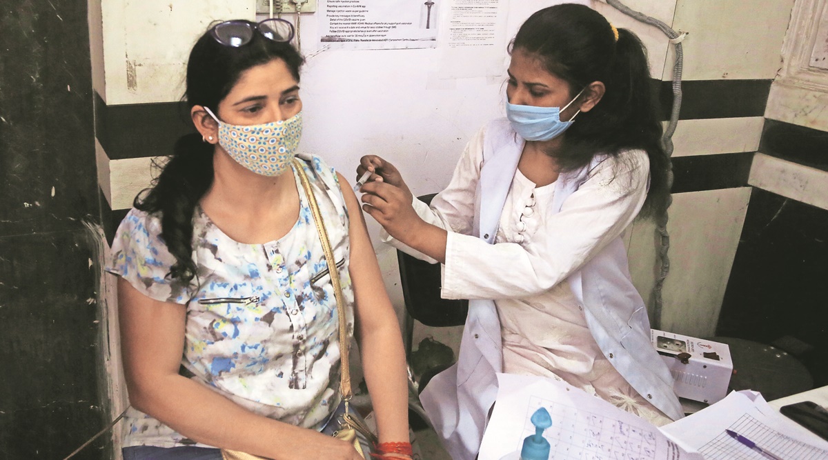 delhi: vaccine net widens, 49k people get their first shot | cities news,the indian express