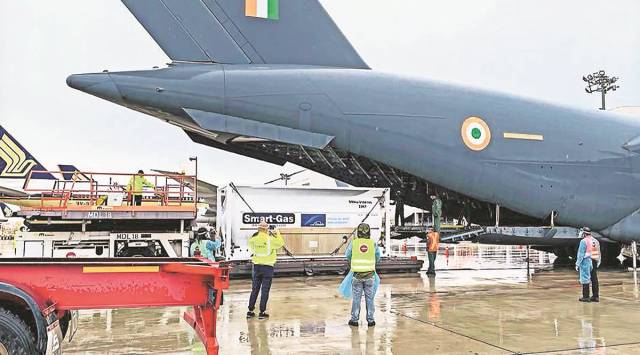 IAF, Navy, Oxygen, Covid-19 India Second Wave, India oxygen from Singapore, Singapore news, Singapore india relations, rajnath singh, india news, indian express