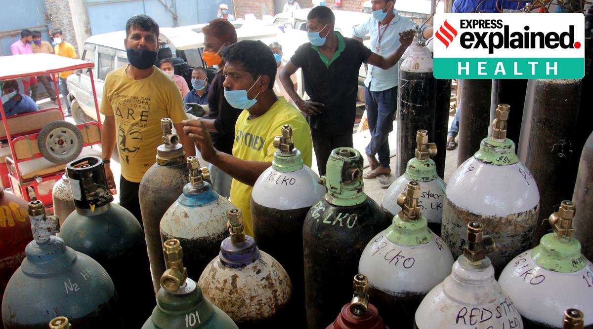 Customers at a store selling medical oxygen cylinders in Lucknow on Friday. (Express Photo: Vishal Srivastav)
