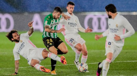 Real Madrid's Marcelo vies for the ball with Betis' Aitor Ruibal, second left, during the Spanish La Liga soccer match between Real Madrid and Betis at the Alfredo di Stefano stadium in Madrid, Spain, Saturday (Source: AP)