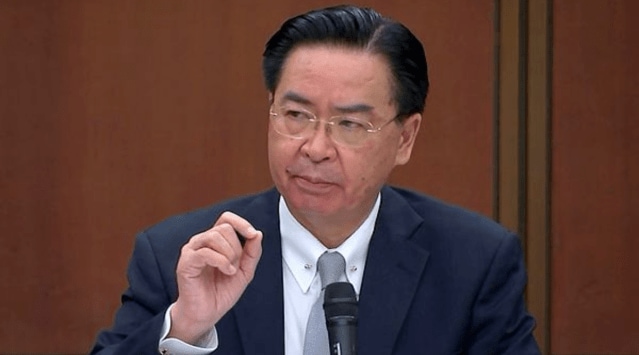 Taiwanese Foreign Minister Joseph Wu speaks during a briefing Wednesday, April 7, 2021, in Taipei, Taiwan. Wu said that China's attempts at conciliation and military intimidation are sending "mixed signals" to people on the island China claims as its own territory to be won over peacefully or by force. (AP Photo)
