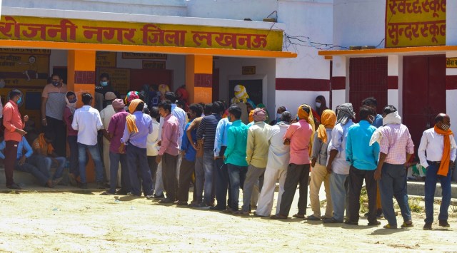 Lucknow: Citizens stand in a queue to cast their vote during the 2nd phase of Panchyat Elections, in Lucknow, Monday, April 19, 2021. (PTI)