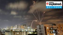 Streaks of light are seen as Israel’s Iron Dome anti-missile system intercepts rockets launched from the Gaza Strip towards Israel, as seen from Ashkelon no alt set