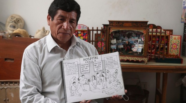 Edilberto Jimenez poses with one of his drawings at his home in San Juan de Lurigancho, on the outskirts of Lima, Peru. (Photo: AP)
