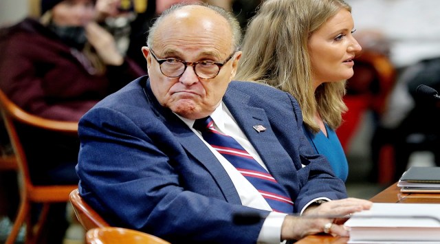 Rudy Giuliani, former President Donald Trump's personal attorney, scans the room during a Michigan House Oversight Committee hearing for suspicion of voter fraud within the state at the House Office Building in Lansing, Mich., on Wednesday, Dec. 2, 2020. (AP)