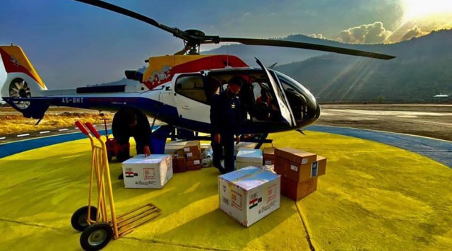 An undated photo provided by the Bhutan Ministry of Health shows a helicopter used for distributing the COVID-19 vaccine to parts of mountainous Bhutan. (New York Times)