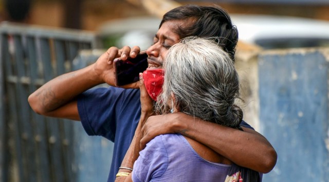 Family members mourn the death of a Covid-19 patient at the Patna Medical College and Hospital on Wednesday. (PTI)