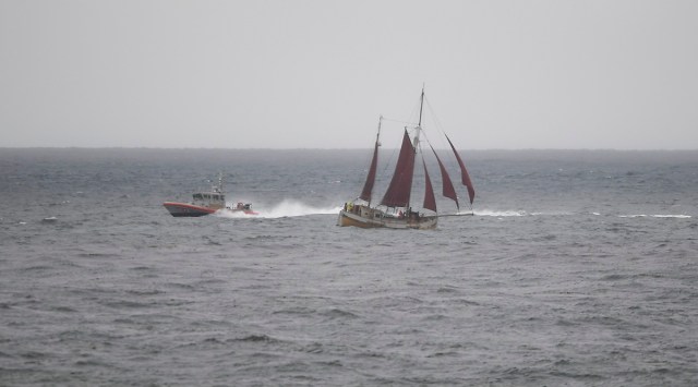 A US Coast Guard boat during a search effort near where a boat capsized just off the San Diego coast on Sunday. (AP)