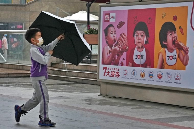 política de tres hijos china