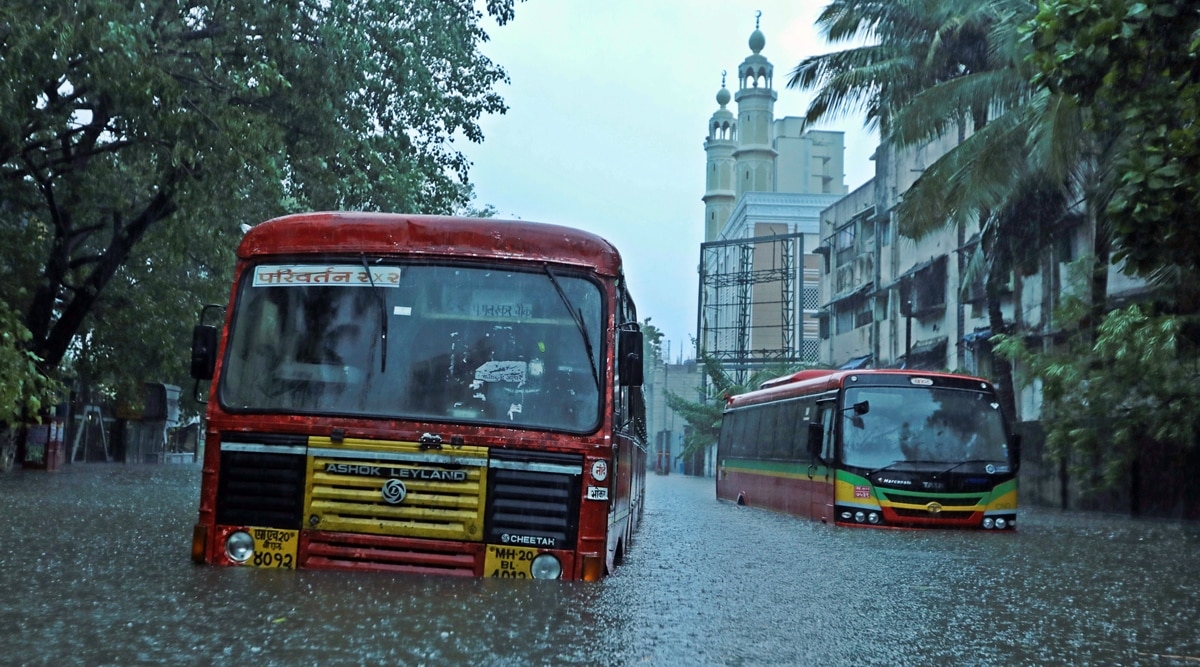 Passenger buses are stranded on a waterlogged road after heavy rains caused by Cyclone Tauktae in Mumbai. (Photo: Reuters)