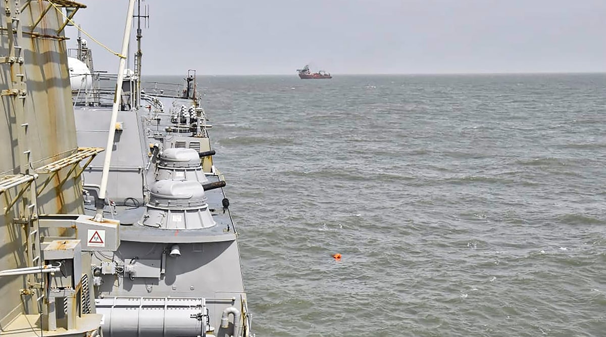 Indian Navy carries out the rescue and search operations for the missing crew members of the barge P305, off the Mumbai coast. (PTI) 