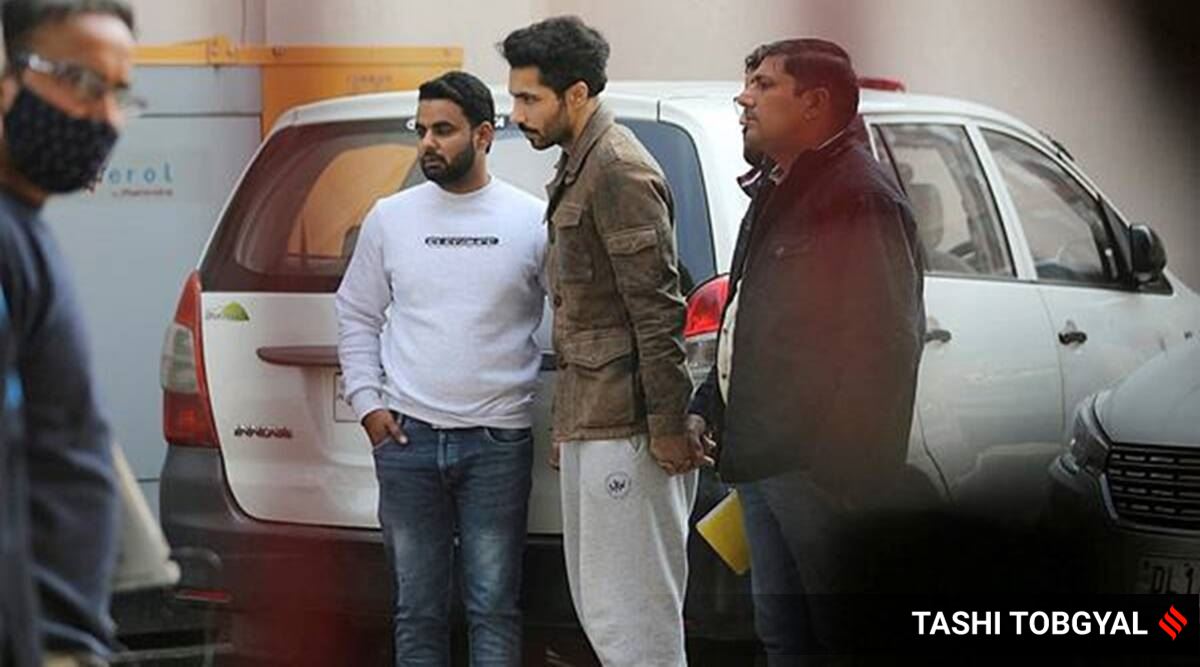 Deep Sidhu with officers of Special Cell in Janakpuri, New Delhi. (Express photo: Tashi Tobgyal/File)