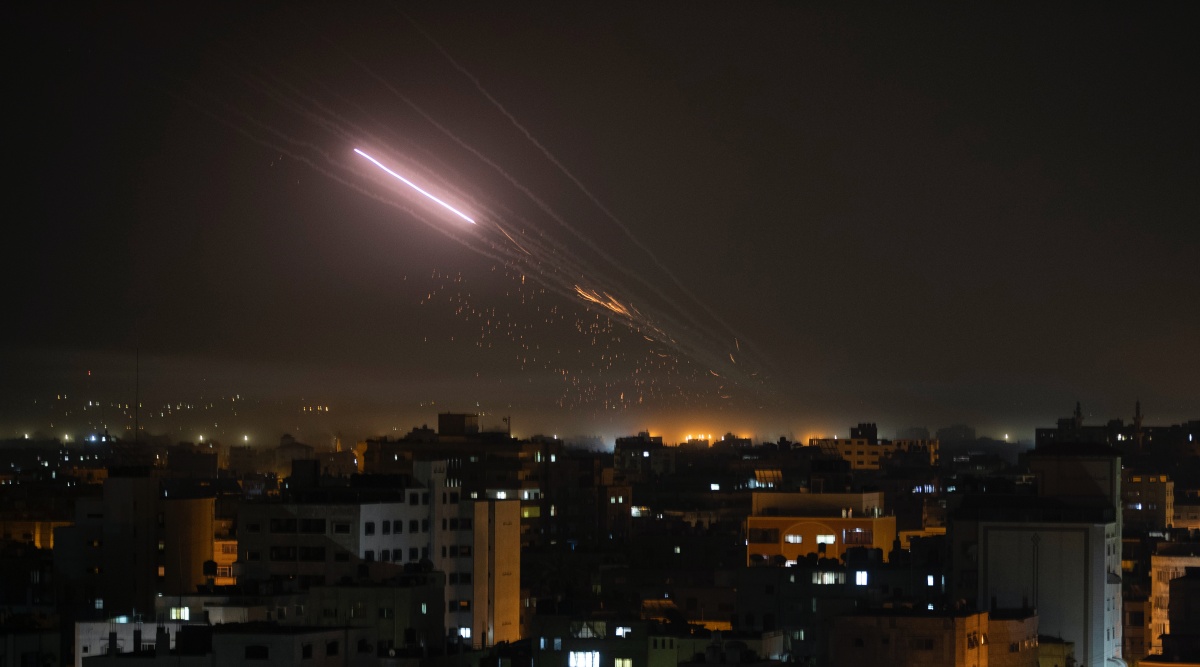 Strike from Gaza kills 2 as Israel topples 6-storey building | World ...