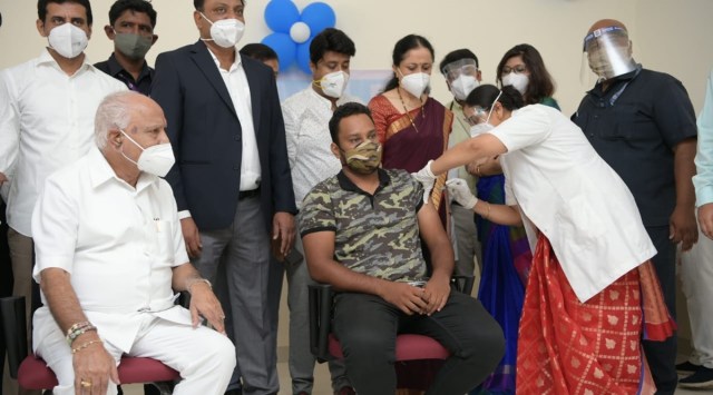 Karnataka CM B S Yediyurappa during the 'symbolic' launch of vaccination drive for age group 18 -44 in Atal Bihari Vajpayee Medical College and Research Institute in Shivajinagar in Bengaluru on May 1. (Express Photo)