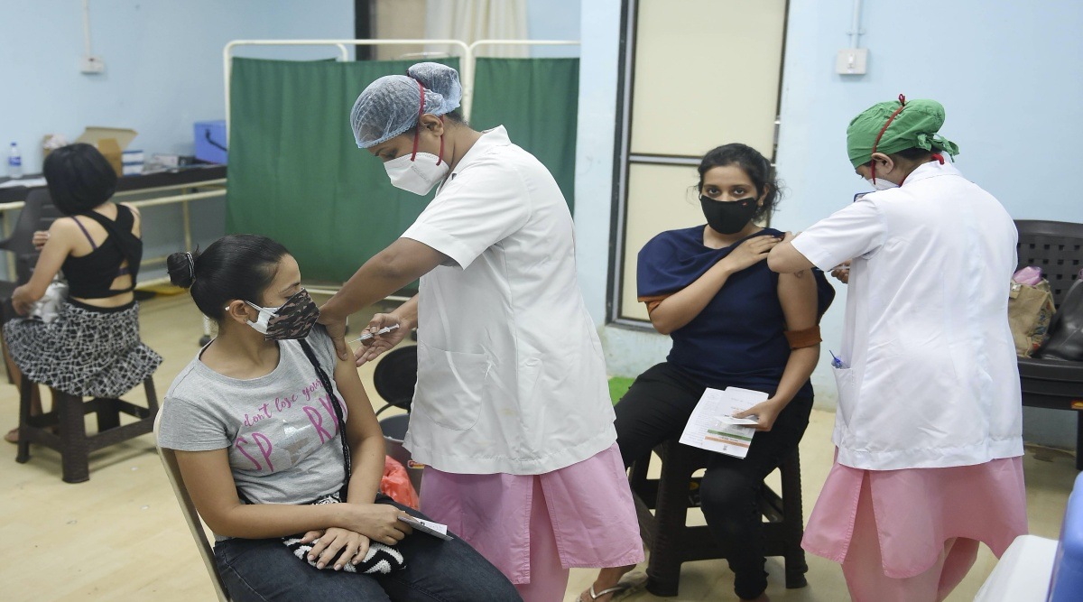 Beneficiaries receive their dose of the Covid-19 vaccine at a vaccination centre in Mumbai. (PTI)