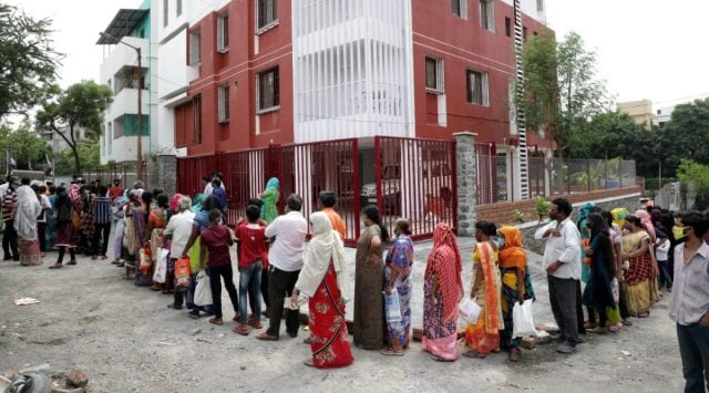 A long queue for the ration kit outside Maher's office in Wadgaon Sheri. (Express Photo by Arul Horizon)