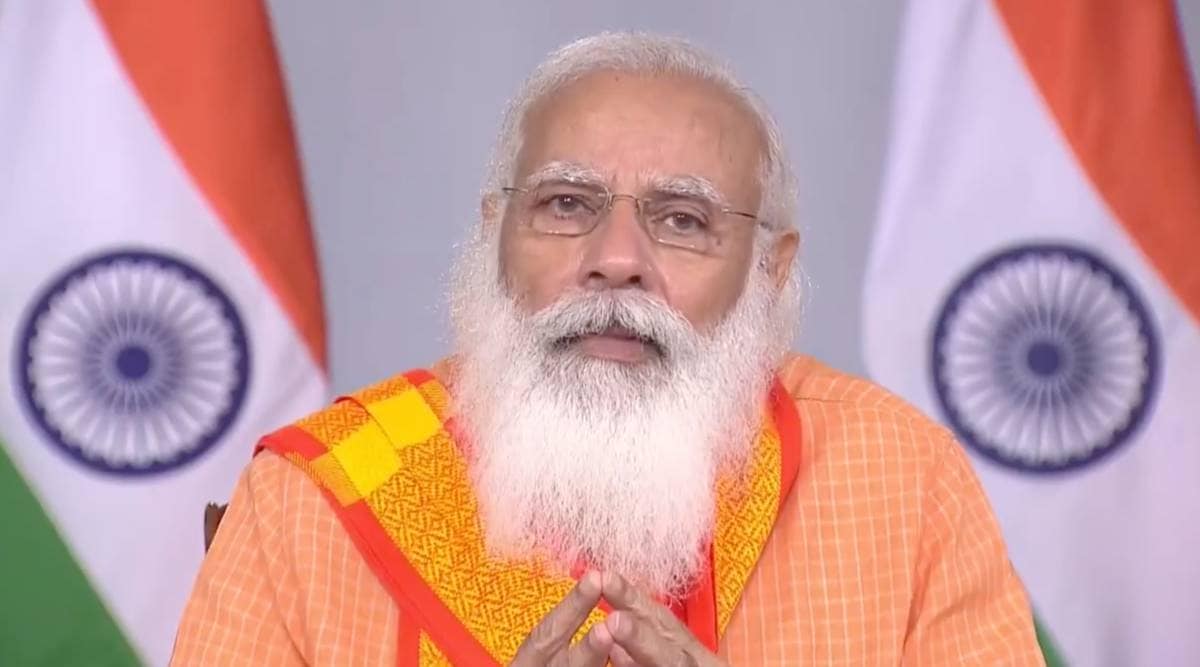 PM Modi while addressing the health workers in Kashi. (Videograb: Twitter @narendramodi)