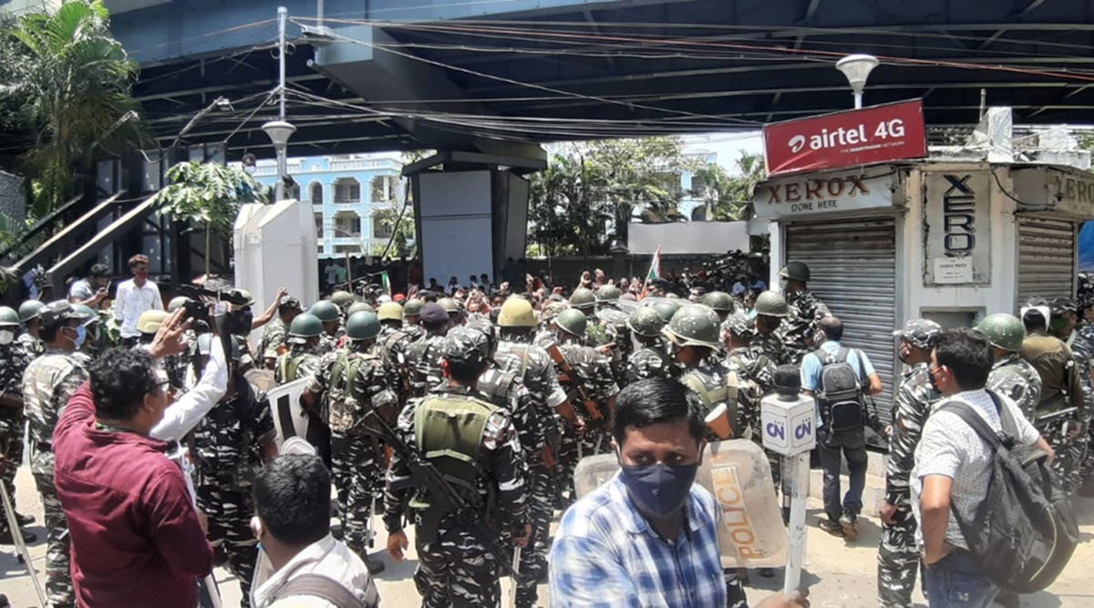 Central forces stand guard outside CBI office in Kolkata where the Trinamool Congress leaders were arrested on Sunday. (Express Photo)