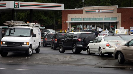 Cars wait in line at a gas station in Charlotte, N.C., on Wednesday, May 12, 2021. (The New York Times)