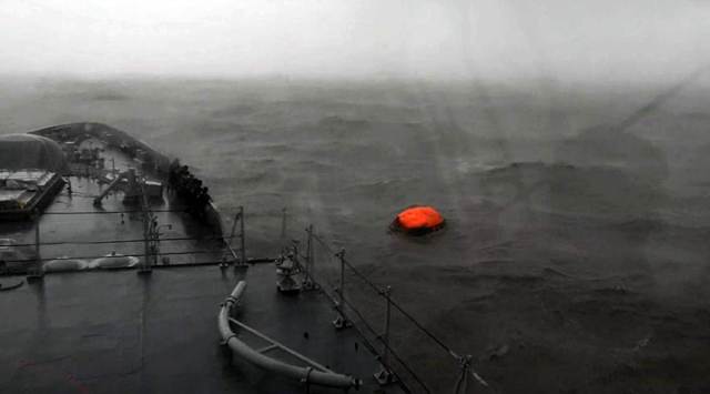 INS Kolkata, which is part of the rescue operations, finds a life raft of vessel Vara Prabha. (ANI)