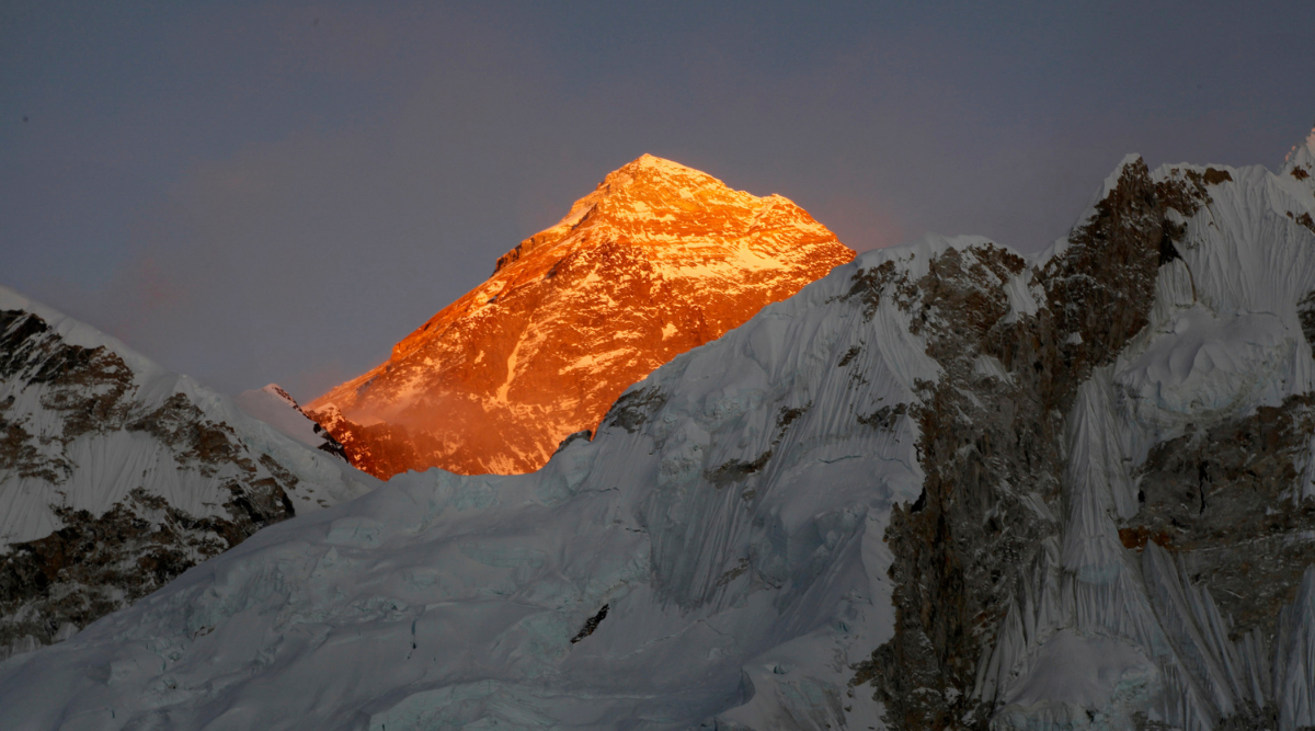 Mount Everest is seen from the way to Kalapatthar in Nepal. A year after Mount Everest was closed to climbers as the pandemic swept across the globe, hundreds are making the final push to the summit with only a few more days left in the season, saying they are undeterred by a coronavirus outbreak in base camp. (AP Photo/Tashi Sherpa, File)