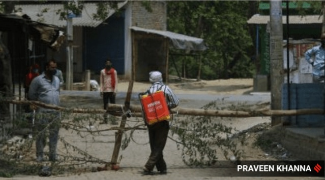 Sanitisation in Sultanpur Khera village in Rae Bareli where 17 people with Covid symptoms have died over the last month. The village has been locked down. (Express photo by Praveen Khanna)